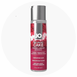 Red Velvet Cake flavored lubricant bottle by Spice Sensuality, designed to enhance intimate experiences, featuring a sleek design and promotional branding.
