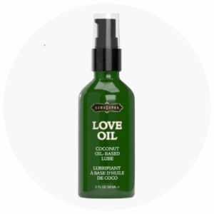 Oil-based lubricant bottle labeled "Love Oil" with coconut oil, featured in a circular background, representing sensual products at Spice Sensuality.